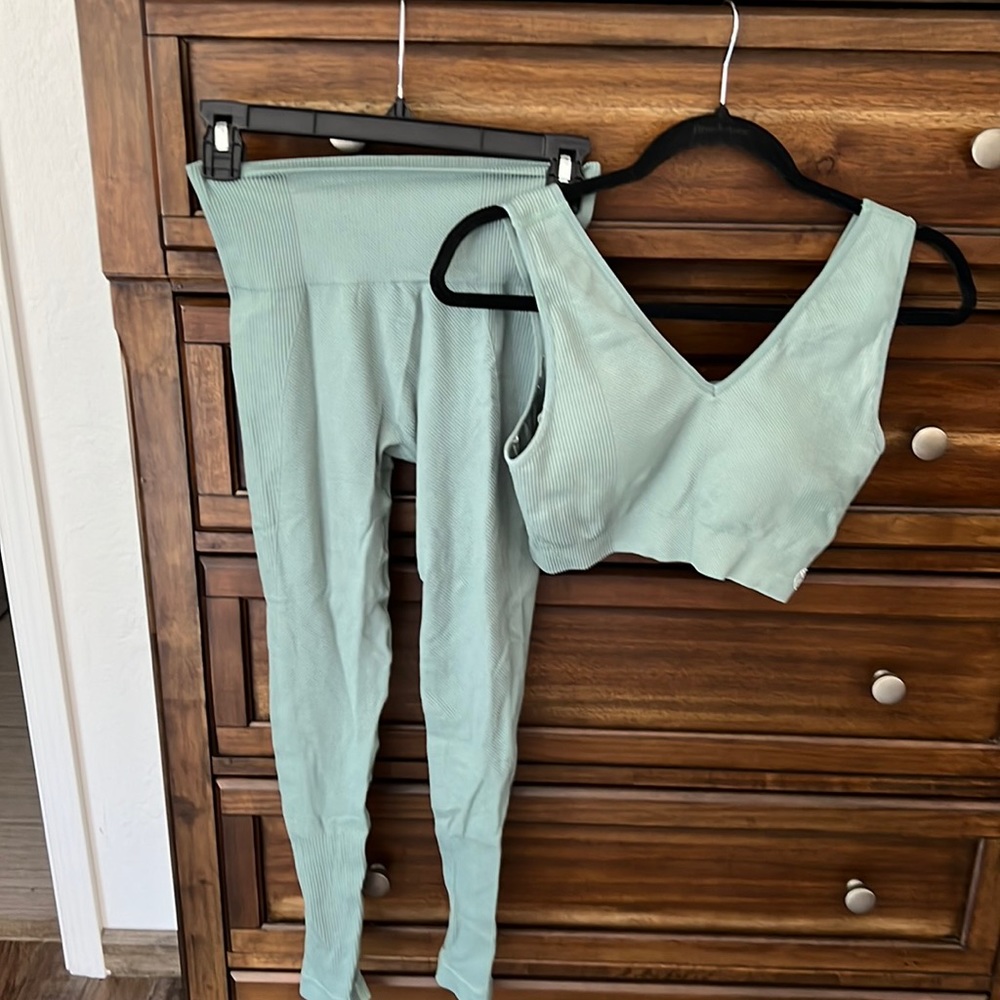 Savvi workout set. Top is large and leggings medium.  Great sage color